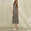 Elegant black and white striped sleeveless maxi dress, perfect for casual or summer wear, offering comfort and style.