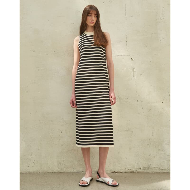 Fashionable sleeveless striped maxi dress perfect for summer and casual outings. Durable fabric, stylish pattern, and comfortable fit ideal for modern women.