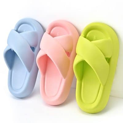 Bright pastel foam slippers in blue, pink, and green, ideal for relaxing at home or casual outings, featuring soft cushioned soles and stylish design for everyday comfort.
