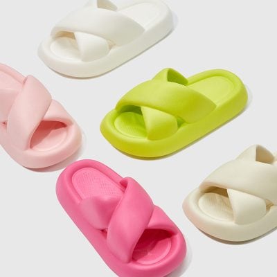 Colorful, trendy slide sandals for women in pink, green, white, and beige, designed for comfort and casual wear. Perfect for everyday fashion, easy to slip on and off, ideal for summer or lounging.