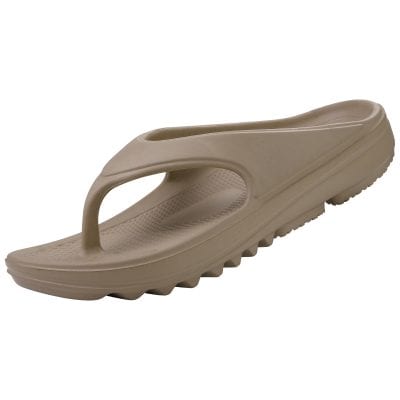 Comfortable beige flip-flops for women or men with a non-slip sole and cushioned support, perfect for casual wear and outdoor activities.