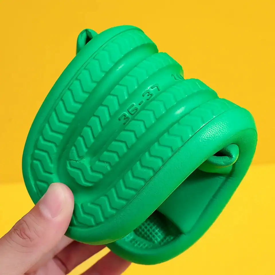 Durable green eyeglass cleaner with textured grip, compatible with all lens types, easy to use, portable, and effective for maintaining clear vision. Perfect for travel and daily care.