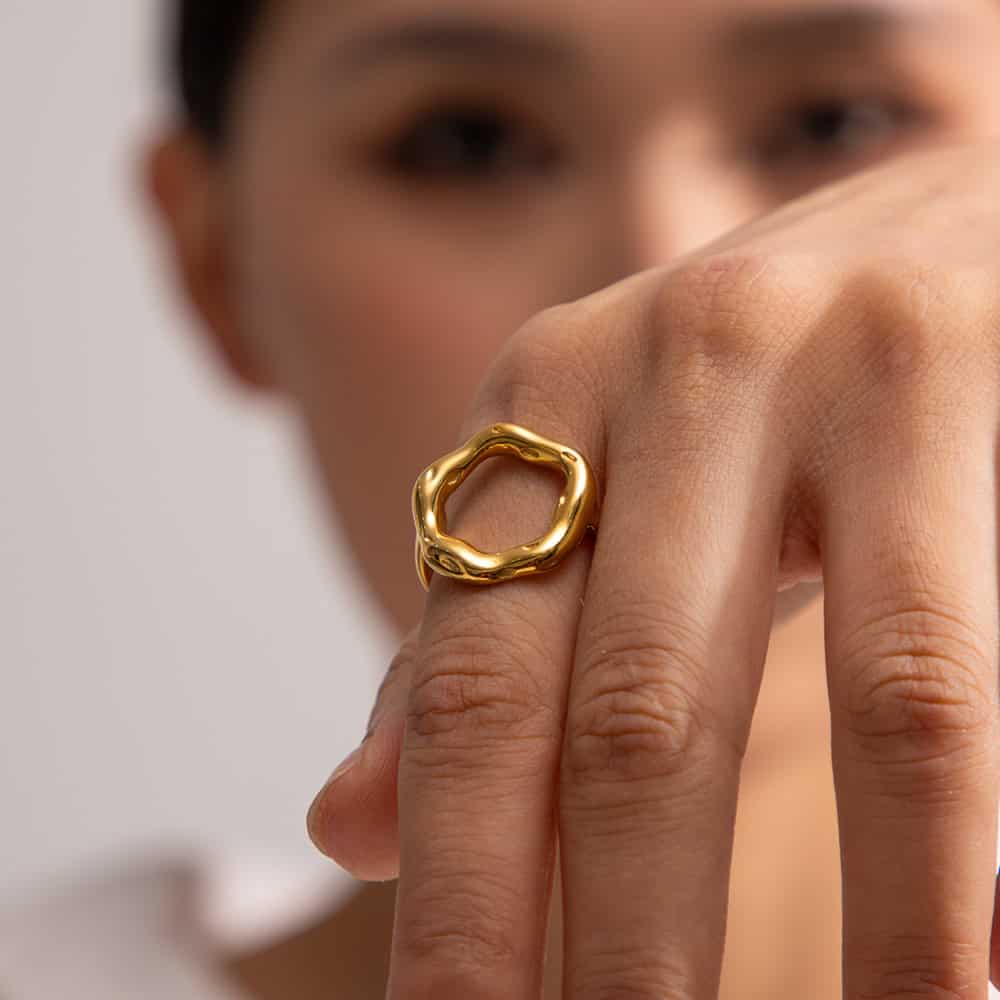 Stylish gold ring with organic, wavy design, perfect for enhancing any outfit, available at Monalisa Store for fashion-forward jewelry lovers.