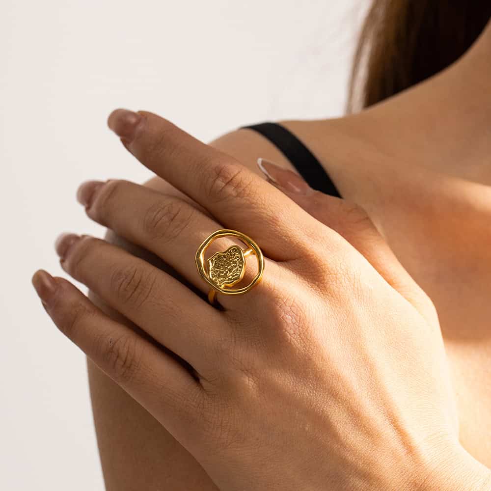 Luxurious gold ring featuring textured design, perfect for stylish jewelry collections and special occasions.