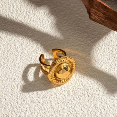 Luxury gold ring with intricate textured detailing, perfect for stylish accessories and statement jewelry, available at Monalisa Store.