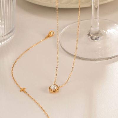 Delicate gold necklace featuring a timeless pearl pendant, perfect for elegant and stylish jewelry from Monalisa Store. Ideal for special occasions and everyday luxury.