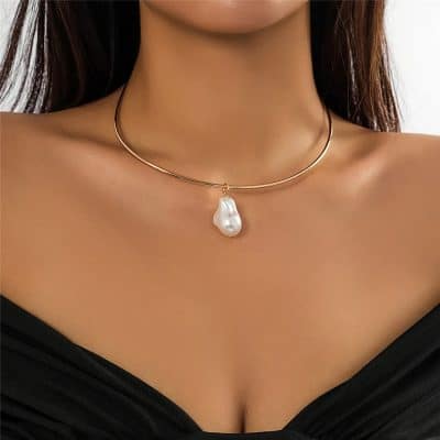 Luxurious pearl pendant on a sleek gold choker, perfect for upscale jewelry shopping and enhancing your elegant look.
