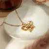 Luxury gold flower pendant necklace, stylish jewelry piece, perfect for women’s accessories, high-quality craftsmanship, ideal for gift giving and special occasions.