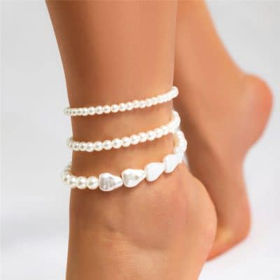 Pearl bracelets on wrist, stylish jewelry, and accessories for women, perfect for special occasions and everyday elegance.