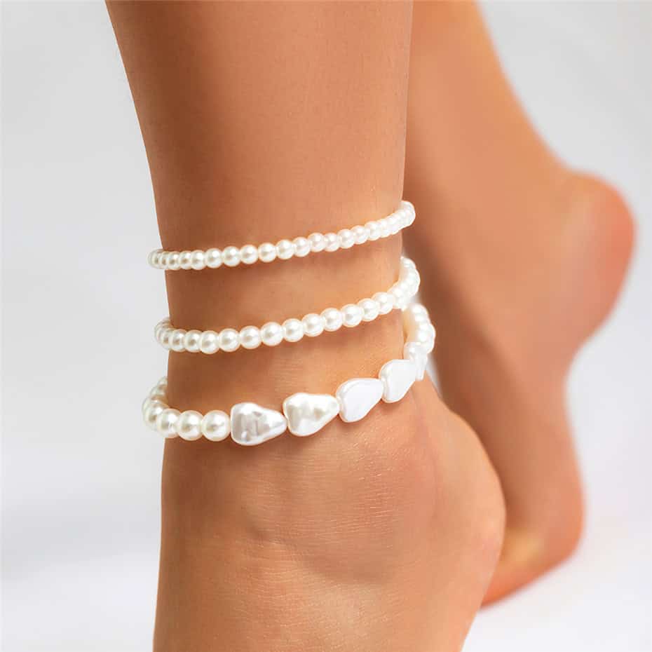 Pearl bracelets on wrist, stylish jewelry, and accessories for women, perfect for special occasions and everyday elegance.