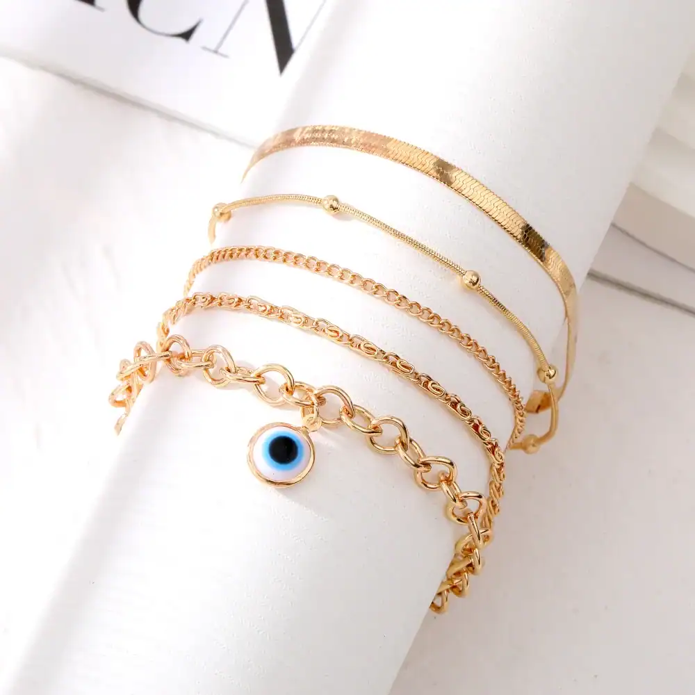 Stunning collection of gold bracelets featuring delicate chain designs, adjustable fits, and trendy styles perfect for women seeking luxury jewelry.