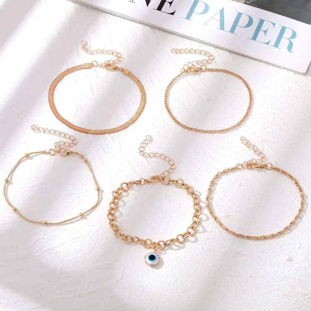 Delicate gold necklaces and bracelets with trendy chain designs and charm accents, perfect for women. Shop the Monalisa Store for stylish gold jewelry collections online.