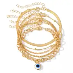 Elegant gold chain jewelry collection including layered necklaces and bracelets with an eye charm, perfect for enhancing your style and adding a luxurious touch.