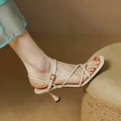 Stylish beige women's sandals with thin straps and a small heel, perfect for summer and casual occasions. Comfortable and trendy footwear available at Monalisa Store.