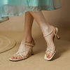 Comfortable nude high heel sandals for women, perfect for summer parties and stylish occasions. Features thin straps, ankle buckle, and a chic design for a sophisticated look.