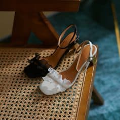 Elegant women's dress shoes featuring ruffle accents, open toes, and adjustable ankle straps, perfect for formal or casual occasions. Shop stylish, comfortable footwear at Monalisa Store for all your fashion needs.