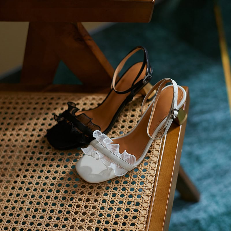 Elegant women's dress shoes featuring ruffle accents, open toes, and adjustable ankle straps, perfect for formal or casual occasions. Shop stylish, comfortable footwear at Monalisa Store for all your fashion needs.