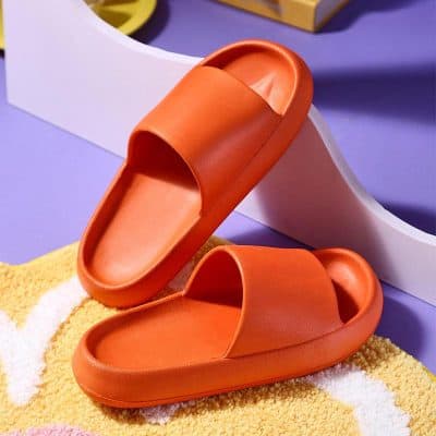 Comfortable orange slides for women and men, perfect for casual wear and relaxation. Lightweight, stylish, and easy to wear, ideal for summer and outdoor activities.