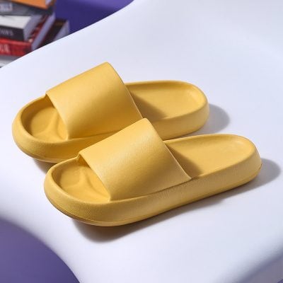 Bright yellow slide slippers perfect for casual wear and indoor comfort at Monalisa Store. Lightweight, comfortable, and ideal for everyday use or the beach.