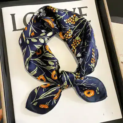 Silk scarf with floral pattern, perfect for elegant accessories and stylish outfits, available at Monalisa Store for a chic addition to your wardrobe.