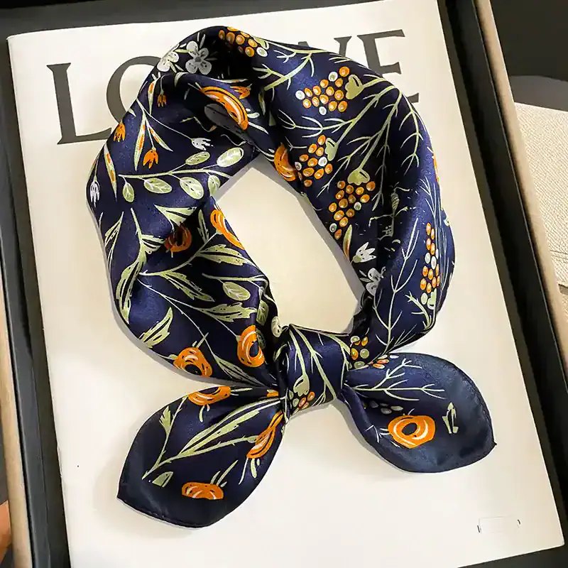 Silk scarf with floral pattern, perfect for elegant accessories and stylish outfits, available at Monalisa Store for a chic addition to your wardrobe.