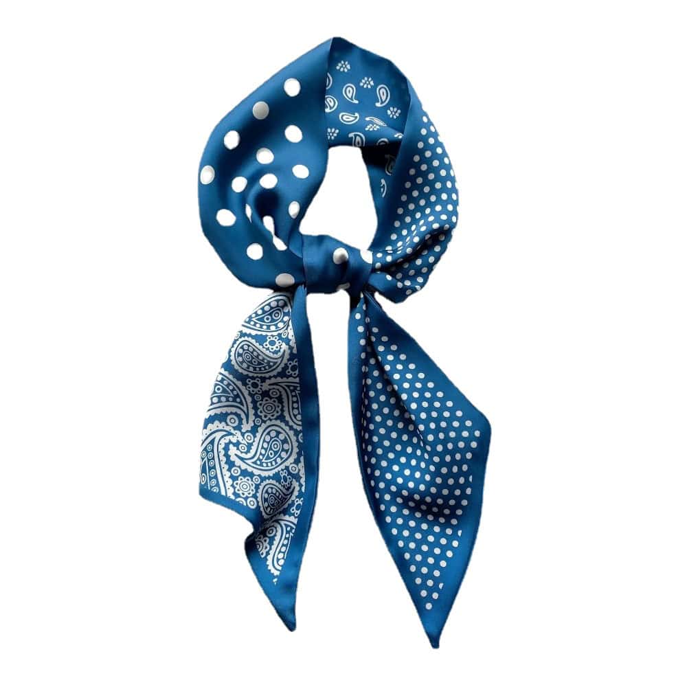 Elegant blue silk scarf featuring polka dots and paisley patterns, perfect for fashion-forward accessories. Ideal for adding a chic touch to any outfit.