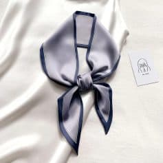 Luxurious silk scarf with sophisticated design, perfect for enhancing your style and skincare routine at Monalisa Medical. Ideal accessory for a polished, fashionable look.