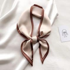 Silk scarf with brown border perfect for fashion accessories and luxury options. Adds elegance and style to any outfit, ideal for women seeking timeless accessories.