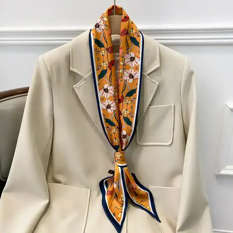Versatile beige blazer paired with a colorful floral scarf, adding a touch of elegance and personality to your wardrobe. Great for office, formal events, or casual outings.