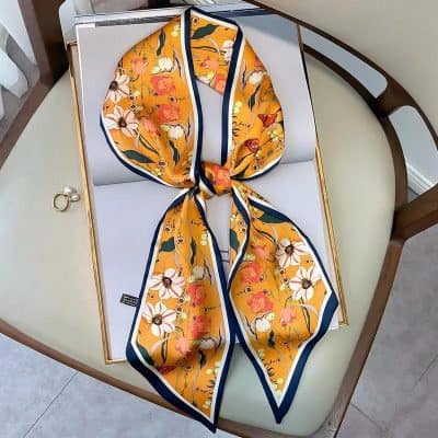 Luxurious yellow floral silk scarf for women, perfect for elegant accessories or fashion statements, available at Monalisa Store.