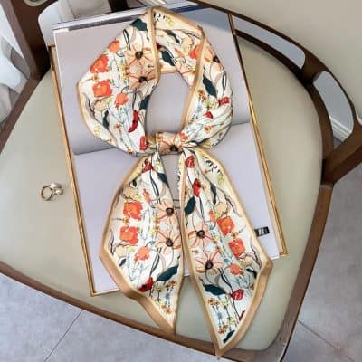Luxury floral silk scarf for women, perfect for fashion accessories, gift idea, and style statement. Crafted from premium silk with vibrant floral design.
