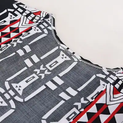 Elegant black, white, and red geometric patterned scarf ideal for fashion accessories and style statements. Perfect for casual or formal wear.