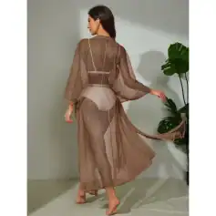 Luxurious women's sheer long kaftan perfect for resort wear, beach cover-up, or stylish casual look, featuring breathable lightweight fabric, flowy silhouette, and modern design.