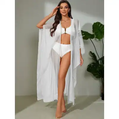 High-quality white bikini cover-up for women, perfect for beachwear or poolside fashion, featuring a stylish see-through design and comfortable fit.