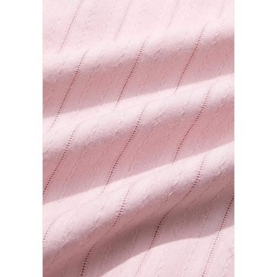 High-quality pink medical fabric with delicate linear patterns, perfect for healthcare apparel, scrubs, and surgical uniforms, combining comfort and style.