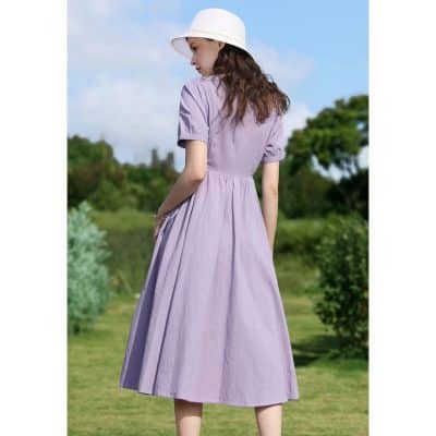 Lavender midi dress with puff sleeves, perfect for women seeking elegant summer fashion. Ideal for outdoor gatherings, casual outings, and stylish daytime wear. From Monalisa Store, offering trendy women's dresses.