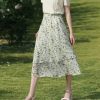 Floral midi skirt perfect for summer fashion and casual or semi-formal occasions, featuring lightweight fabric, flowy design, and a chic pattern ideal for women seeking stylish and comfortable clothing.
