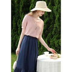 Beautifully styled casual outfit perfect for sunny days, featuring comfortable fabrics and chic accessories for an upscale, yet relaxed look.