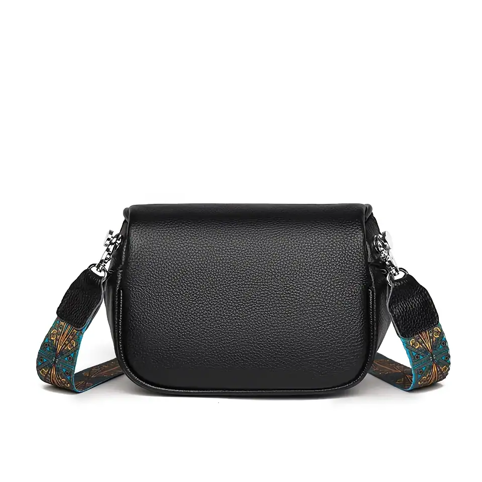 Elegant black leather crossbody bag with colorful, patterned strap, perfect for accessories or daily use, combining style and functionality for women.