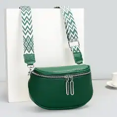 Stylish green leather purse with adjustable woven strap for women. Perfect for travel and daily essentials, available at Monalisa Store.