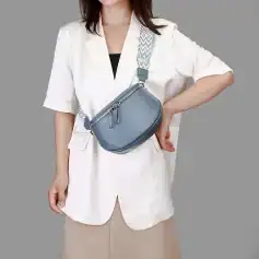 Fashionable gray crossbody bag with multiple zippers, perfect for everyday use and enhancing your style. Durable and lightweight, ideal for casual outings and shopping.