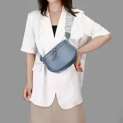 Fashionable gray crossbody bag with multiple zippers, perfect for everyday use and enhancing your style. Durable and lightweight, ideal for casual outings and shopping.