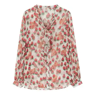 Light, colorful mushroom-print blouse with a ruffle front and tie neckline, perfect for casual or chic fashion statements. Adds playful style to any wardrobe with comfort and unique design.