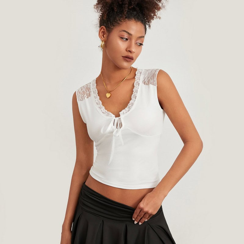 Elegant women's lace top with a V-neck, delicate lace details, and a front tie bow for a perfect fashionable look. Ideal for casual or dressy occasions.