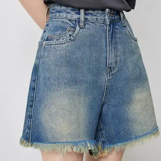 Comfortable high-waisted denim shorts with frayed hem, perfect for casual fashion and summer wear. Ideal for relaxed outings and stylish everyday look.