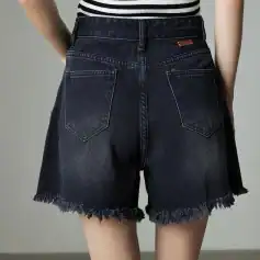 Comfortable high-waisted black denim shorts with frayed hem, perfect for summer fashion.
