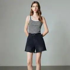 Stylish black distressed denim shorts for women, perfect for casual and summer wear, with trendy frayed hem and high-waisted fit.