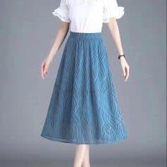 Stylish blue maxi skirt with a sheer, wavy pattern, perfect for casual and office wear. Made from lightweight, comfortable fabric, suitable for all seasons.