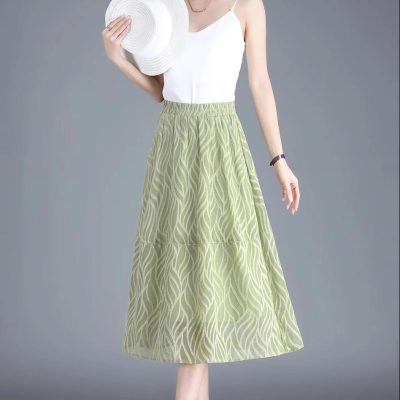 Stylish green maxi skirt with leaf design, great for summer outfits and casual occasions, offered by Monalisa Store.