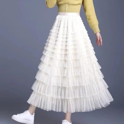 Stylish white layered tulle maxi skirt for women, perfect for fashion-forward looks and special occasions. Comfortable and trendy, ideal for enhancing your wardrobe with a chic, feminine touch.